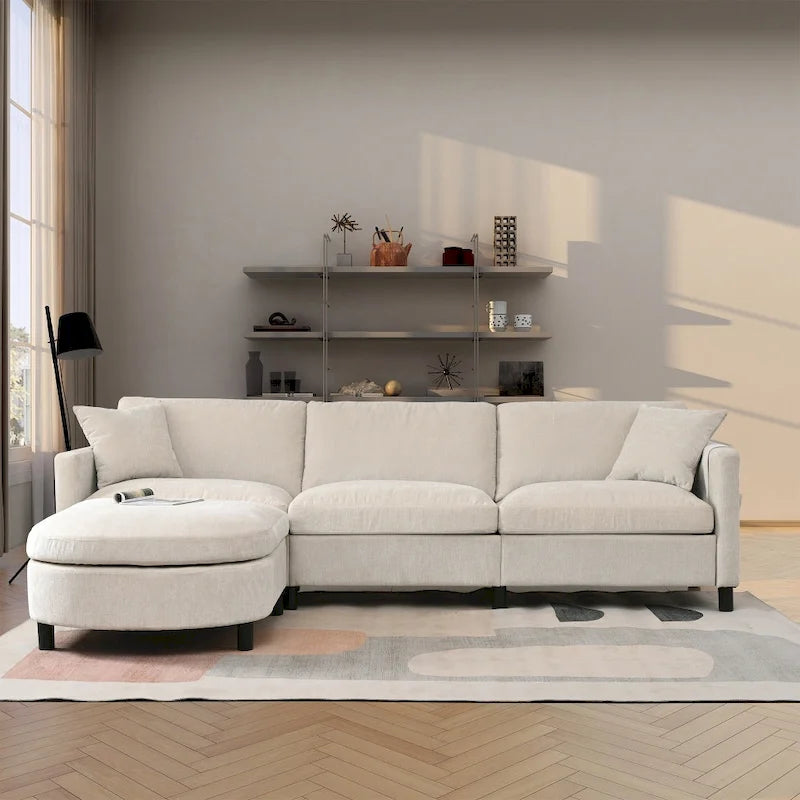 Élégant canapé en mousse avec coussins et pouf