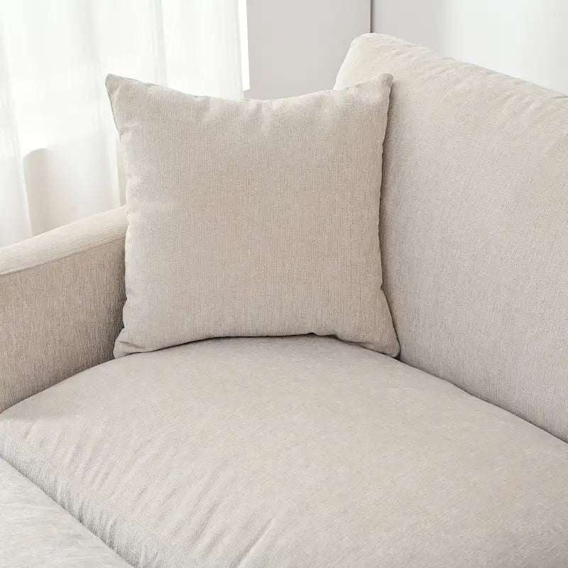 Élégant canapé en mousse avec coussins et pouf