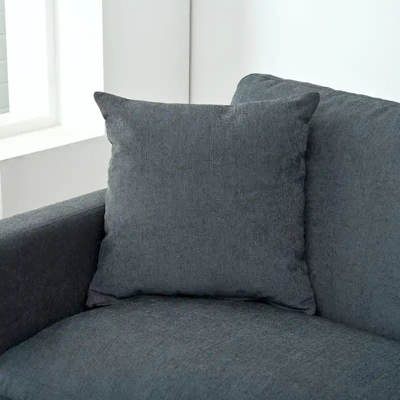 Élégant canapé en mousse avec coussins et pouf